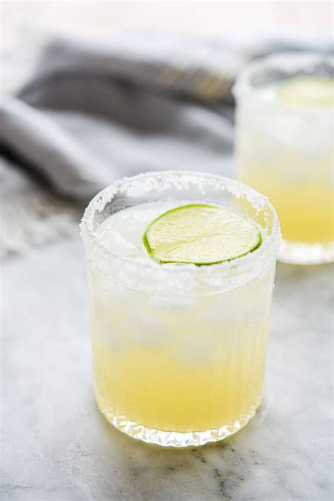 Margarita recipe without triple sec. For a 4-oz serving of this margarita mix has just over 100 calories, which all come from carbohydrates. Each serving has 24 g of carbs! It’s basically a blend of water, corn syrup, and sugar. SKINNY MARGARITA – Its name basically gives it away…it’s a lower-calorie version of a regular margarita. 