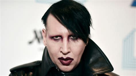 Marilyn Manson, accused of blowing his nose on videographer, to enter plea