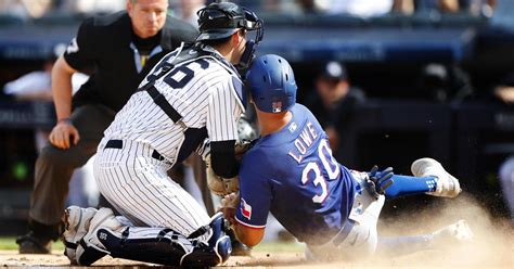 Marinaccio, Holmes escape trouble, Yankees beat Rangers 1-0 on McKinney homer