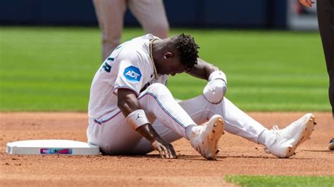 Marlins CF Chisholm exits with injury after steal attempt
