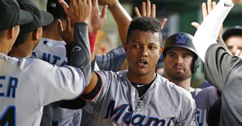 Marlins try to end road slide, take on the Cardinals