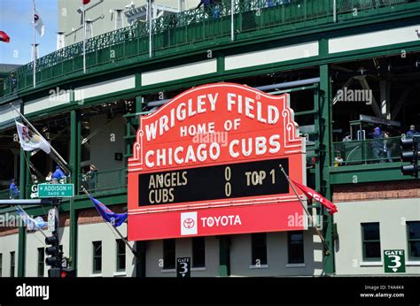 Marquee gate wrigley. Apr 7, 2014 · The marquee, at first colored fern green, originally read, "Wrigley Field, Home of the Cubs," and featured the same cascading soft curved lines still seen today. Although placing an elegant marquee at the main entrance makes sense, the sign did not fit the corner of Clark and Addison in 1934. A coal yard sat across Clark Street, sending smoke ... 