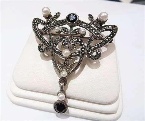 Sterling silver marcasite earrings, Silver 925 dangle marcasite earrings, Dangle & drop marcasite earrings, silver marcasite jewelry. (113) $34.00. Vintage sterling silver DIAMOND watch. Polished and very clean. Onyx & Marcasite gemstones. New battery.