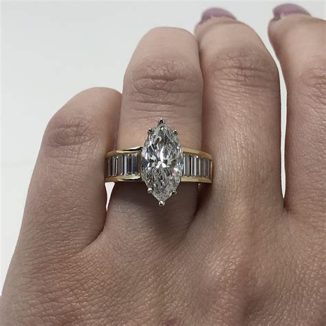 Marquise cut diamond. Marquise Cut Diamond and Round Brilliant Cut Diamond Wedding Band Engagement Ring in White Gold (649) Sale Price $805.50 $ 805.50 $ 895.00 Original Price $895.00 (10% off) FREE shipping Add to Favorites Vintage Moissanite Marquise cut Wedding Band 14k Yellow Gold Engagement Band Women Full eternity Band Promise Ring Anniversary … 