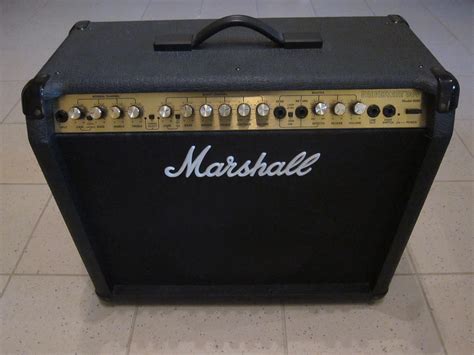 Marshall valvestate. Make/Model: Marshall VS100. Serial #: 968602632. Power source: Tube Driven Preamp in a Solid State Package. Watts: 100 Watts RMS. Weight: 25.8 lbs. Dimensions: 23.25 x 10 x 9". Features: Includes Foot Switch and Power Cord. Condition: This valvestate Marshall amplifier head looks good! There are some scuffs and scratches throughout the tolex ... 