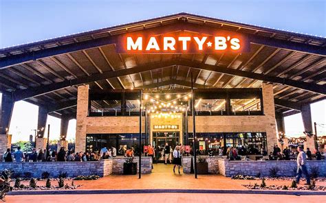 If you want to picture Marty B’s, in Bartonville, imagine the opposite of Snow’s BBQ, in Lexington. While the number one barbecue joint in Texas is …
