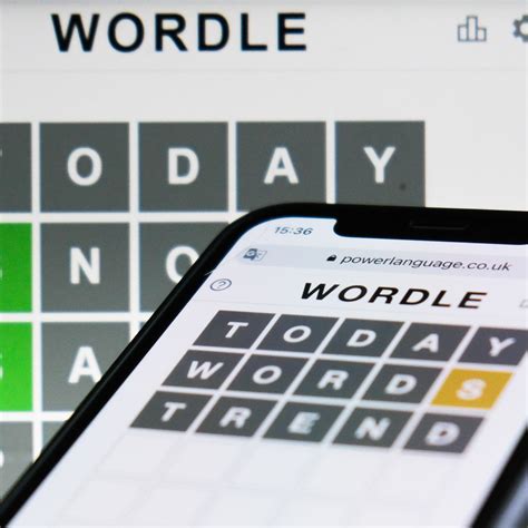 Woman playing Wordle on her smartphone while traveling on an underground train on 5th March 2022 in London, United Kingdom. Wordle is a web-based word game played by millions of users / players .... 