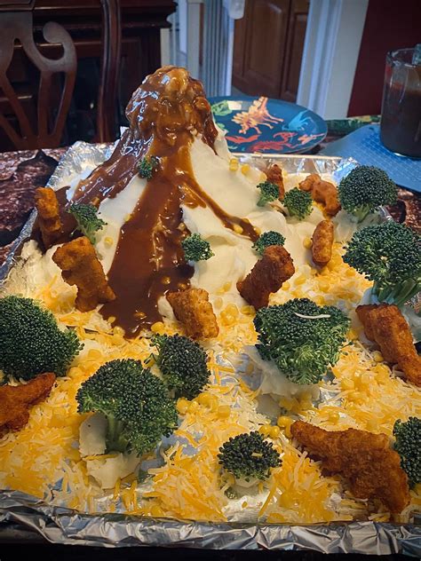 Mashed potato volcano with dino nuggets. “The first video of my volcano has over 14 million views on TikTok and cost less than $20 to make,” she said. “I used a box of dino nuggets ($9), a frozen broccoli package ($3) and a box of flaky mashed potatoes ($3.50),” she added. Maune said her first attempted mountain had gravy that was a bit watery, so she tried the whole thing again. 