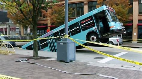 Massive sinkhole in Pittsburgh swallowed up a stopped city bus