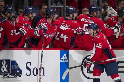 Matthew Phillips scores against his old team, Capitals beat the Flames 3-2 in a shootout