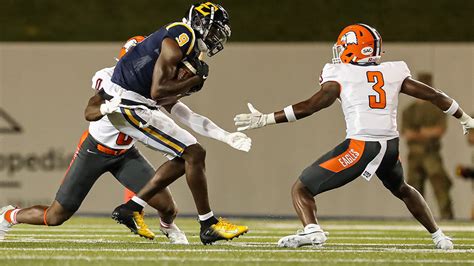 May accounts for 3 TDs, East Tennessee State waits out storm, blanks Carson-Newman 42-0.
