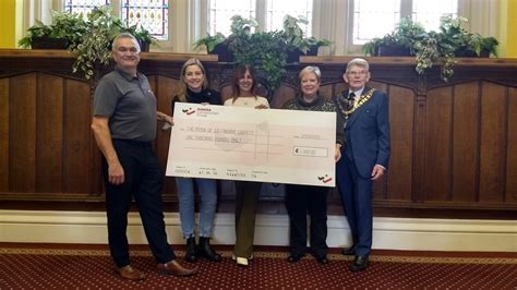 Mayor’s charities presented with £1,000 from local firm