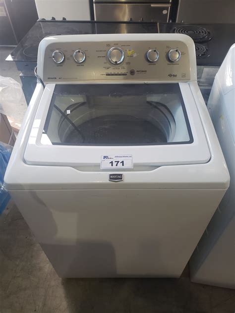 Maytag Bravos MCT top loading washing machine makes loud pounding noise during spin cycle ... I have a top loading kenmore 2009 washer that works ok until the spin cycle and then becomes out of balance and shakes violently .... 