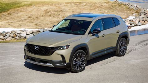 Mazda cx50 review. SCREENSAVER The 2023 MAZDA CX-50 2.5 Turbo ($43,575, as tested, in Premium Plus trim) is essentially a reskinned CX-5 with a more outdoorsy stance and slightly raised ground clearance. Among the ... 
