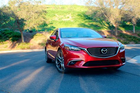 Mazda grand touring. Things To Know About Mazda grand touring. 