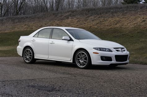 The Mazdaspeed 6 is powered by a turbocharged, 2.3-liter inline four-cylinder with direct injection. The engine produces 274 hp and 280 lb-ft of torque, and is mated to a six-speed manual ...