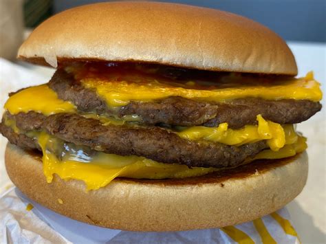 Mcdonalds triple cheeseburger. These values are recommended by a government body and are not CalorieKing recommendations. There are 588 calories in 1 burger of McDonald's UK Triple Cheeseburger. You'd need to walk 164 minutes to burn 588 calories. Visit CalorieKing to see calorie count and nutrient data for all portion sizes. 