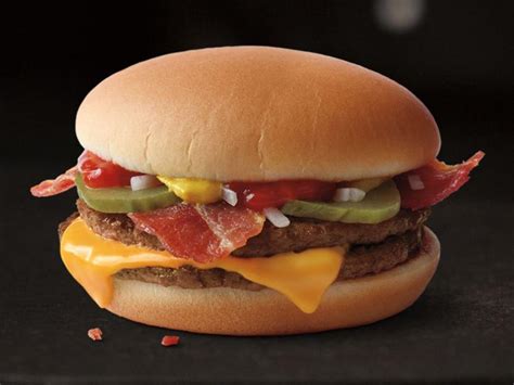 Mcdouble carbs. The McDouble, known for its affordability and simple yet satisfying taste, features two beef patties with a single slice of cheese, while the Daily Double steps up the game with a more loaded option, including two beef patties, two slices of cheese, and additional fresh toppings. This comparison looks beyond just the taste and cost, delving ... 