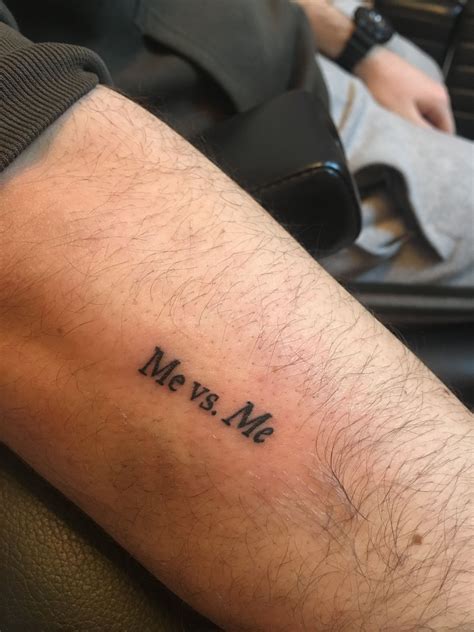 Me vs. Me tattoo Hand tattoos for guys, Small tattoos for guys, Wrist