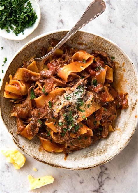 Meat ragu. Add the thyme, oregano, paprika, pepper flakes, salt, pepper, tomato paste stirring well. Pour in the canned tomatoes including juice, the red wine and beef broth and stir. Bring the beef ragu to a simmer and turn the heat to low. Simmer for 45 minutes uncovered making sure to stir it … 