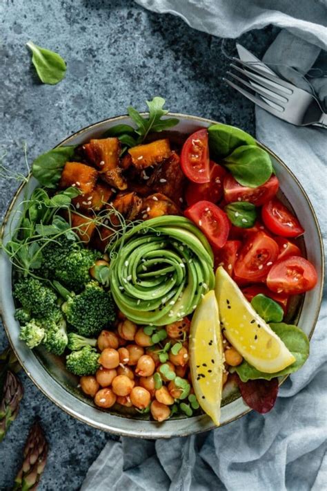 Mediterranean cuisine vegetarian recipes. The ultimate Mediterranean Bowl with greens, hummus, olives, parsley-tomato salad, classic vegan falafel, and a variety of sauces! My go-to easy recipe when we' ... 