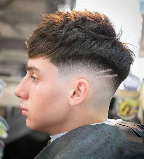 Keeping the sides and back faded will allow you to focus on the top. Layered Pompadour – This style finds common ground between the low fade pomp and the quiff. Have your barber cut the top hair .... 
