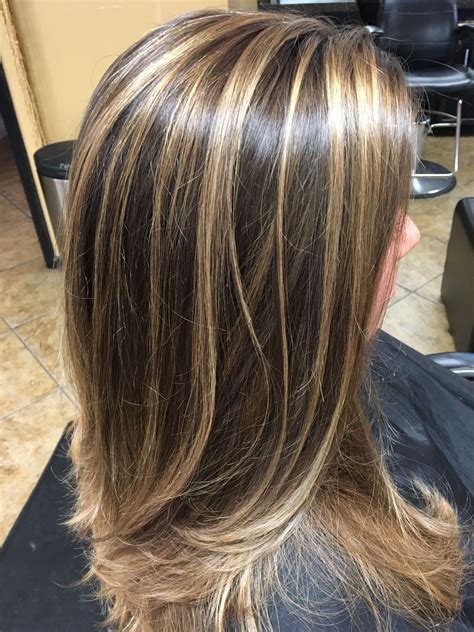 16. Light Dishwater Blonde Bob. Once you try this dishwater blonde color melt, it will become your favorite hairstyle! Easy to maintain and pretty when growing, this hair color will instantly turn your medium bob into a fancy style worthy of adoration. @melissaschlukebieroficia. 17.. Medium length brown hair blonde highlights