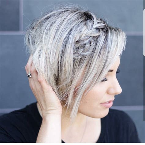 Medium length pixie haircut. If you’re someone who loves experimenting with your hair, medium length layered haircuts are a perfect choice. They offer versatility and style while maintaining a manageable lengt... 