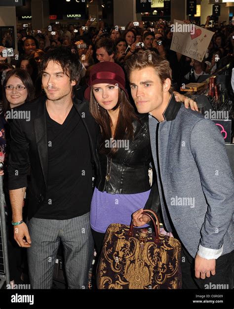 Paul Wesley and Ian Somerhalder pose at a meet and greet for fans at Vampire Diaries Season 2 Cast Tour at Hot Topic store at Sunset Place on October 23, 2010 in Miami, Florida.. 