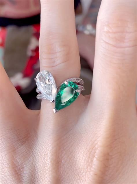 Megan fox engagement ring. Jan 13, 2022 · Megan Fox and Machine Gun Kelly have announced their engagement. The pear-cut diamond and same-shaped emerald engagement ring was designed by British designer Sophia Webster. 