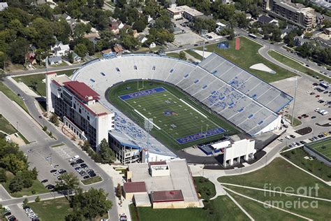 Recognized as the first stadium built on a college campus west of the Mississippi River, David Booth Kansas Memorial Stadium is the seventh oldest collegiate stadium in the nation. Located at the north base of Mt. Oread at 11th and Maine streets in Lawrence, it has a capacity of 47,000.. 