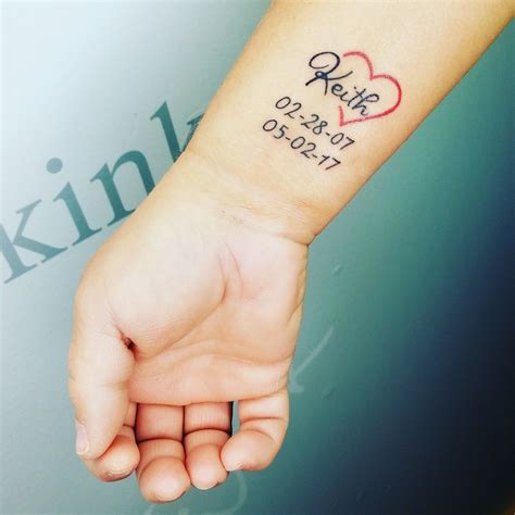 Memorial wrist tattoos. Find inspiration for memorial tattoos that pay tribute to your beloved mom. Discover heartfelt designs that capture her spirit and keep her memory alive forever. 