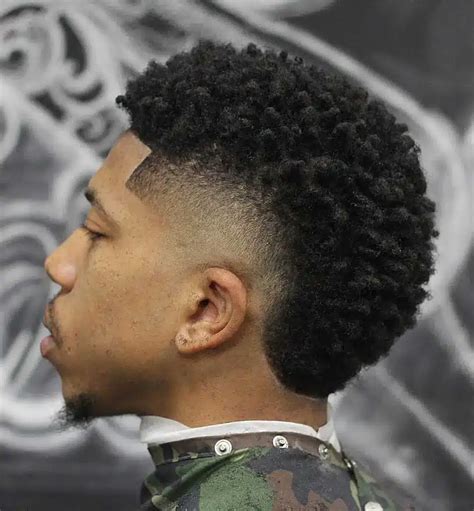 The traditional fade haircut is longer on top and short (or bald) along the sides and back. The burst fade haircut, on the other hand, is tapered along the sides and back, shortest right around the ears. In essence, it’s the male equivalent of the frohawk. In recent years, male celebs such as Usher have helped popularize the burst fade.. 