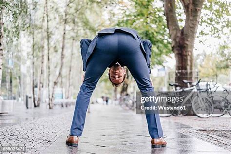 Men bent over pics.  Download Men Bending Over Pics stock photos.  Browse 7,110 authent...