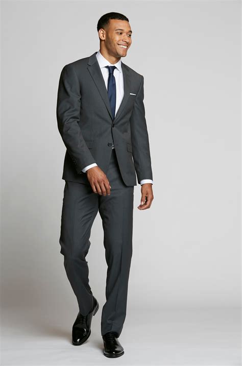 Men wedding guest attire. Wear it with a white dress shirt (Charles Tyrwhitt's are solid picks) and a burgundy tie (Enzo Custom has you covered) for a look you'll be proud of when you're looking back on those wedding photos in a few years. Suit for $499 | Indochino. Shirt for $40 | Charles Tyrwhitt. Tie for $85 | Enzo Custom. 