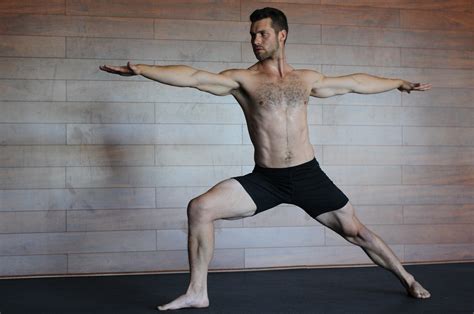 Men yoga. Open your chest as you twist to the right on an inhale, bringing your right arm and gaze up at the ceiling. This is your chair version of extended side angle pose. Hold here for several breaths. Bring the right arm down on an exhale. Do the same position with the right arm down and the left arm up. 5. 