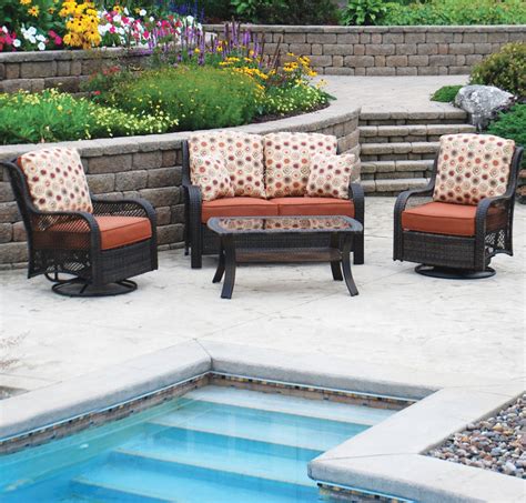 Menards outdoor furniture. The Backyard Creations® Camas patio seating set is a perfect addition to any patio. It includes two stationary chairs, a two-seater sofa with center table, and a coffee table. The two chairs feature a comfortable, removeable cushioned seat made from durable sling fabric. The coffee table has a faux wood slat top. The wicker trim is dark brown with gray cushions made of olefin fabric. The ... 