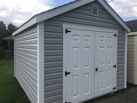 Menards shed siding. The Prescott 8 x 12 shed is a stylish and dependable outdoor storage solution designed to elevate your lifestyle. The interior features 96 sq. ft. of space to call your own. Make it a work from home space, workshop, personal getaway or storage shed. 6 foot tall sidewalls give you overhead room and vertical storage for garden tools, ladders and more. Specially engineered LP® Smartside® siding ... 