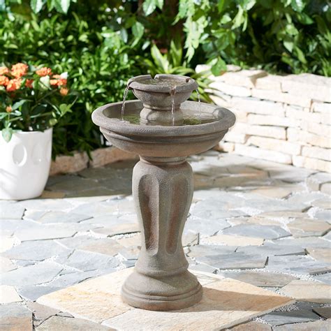 Sharing the look of a rustic faux stone waterfall, the Marrieta Ridge Fountain will find create a scenic garden focus, nestled in a flower bed, by your back steps, or under the apple tree. Revel in the peaceful sound of pouring water and enjoy the soft glow that emanates from the basin below. Make this your statement piece in front of your home entrance walkway or share it with the natural .... 