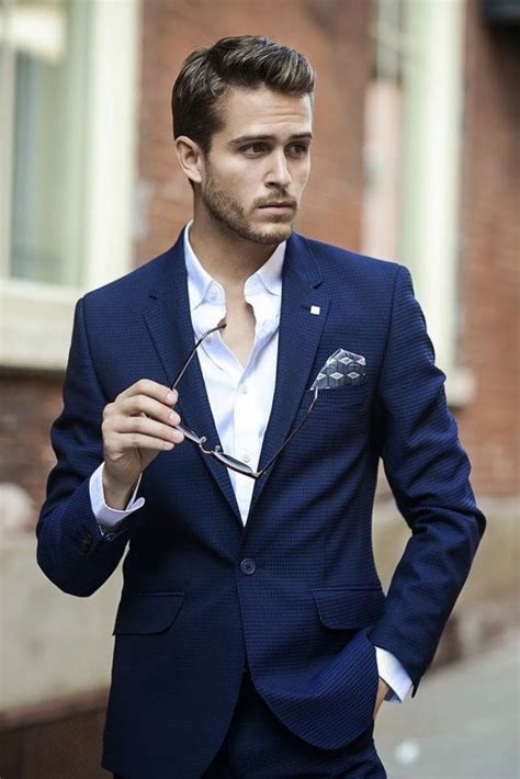 Mens cocktail attire wedding. Make sure to wear black shoes and a tie with it. Wear a black necktie instead of a bow tie to bring the look down one level into Formal range. If your winter wedding seems to fall more on the casual edge of Formal, wear a black suit, a jewel-toned shirt, and no tie at all. A pocket square can add a sophisticated touch, and … 