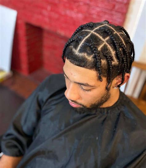 Mens short braids. Bun With High Skin Fade. Faux Hawk French Braid For Men. Bun With Highlights. Duo Tone French Braid For Men. Ponytail With Shaved Hairline. Short French Braided Bun. Four Strand French Braid. Sleek French Braid For Men. Long Ponytail With Temple Braids. 
