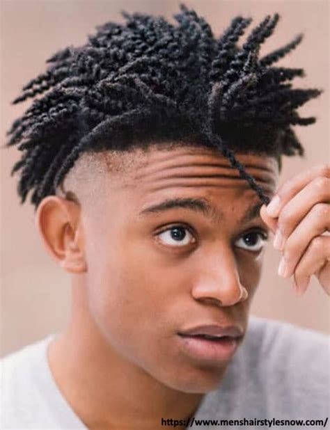 The half-up twist is all about combining two looks into one. In this style, the hair in front is twisted and pulled back while the sides are kept loose for a unique look that stands out from the crowd. This style is perfect for medium to long hair and requires minimal upkeep. Source: @ledanieljames via Instagram. 10.