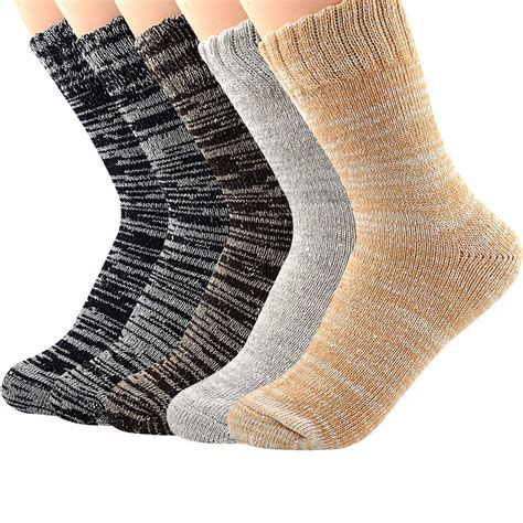 Mens wool socks. MERINO WOOL BLEND of 72% MERINO WOOL, 27% NYLON AND 1% SPANDEX - Ideal blend for a softer breathable sock. They are durable and very comfortable. See Product Description below for size information. Machine Wash in warm water with socks inside out. Air Dry is best to minimize pilling which is … 