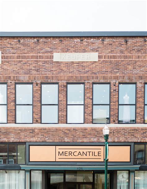Mercantile hall. Pictured is the current version of Racine Mercantile Hall, a 126- by 28-foot raised roof barn with wooden sides, paneled wood sheeting inside the walls and a poured concrete foundation and floor. 