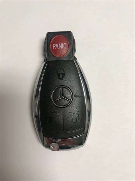 Mercedes key fob replacement. Once the battery compartment is opened, replace the batteries. If you have a Chrome Key, pull the latch at the bottom and push the key into the thinner end of the slot. Then, remove the cover and replace the old battery with the new one. For either key, make sure that the new battery is facing in the right direction. 