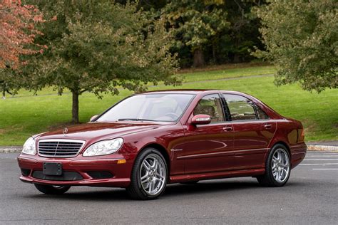 The closest I've seen is an E55 AMG vs. an S65 AMG. The S65 pulled pretty well on the E55. I know, the E55 is said to be de-tuned a little bit vs. the S55, but the E55 is also a little bit lighter. My conclusion: TiffanyTwisted's prediction is the likely result between the S55 and the S600.. 