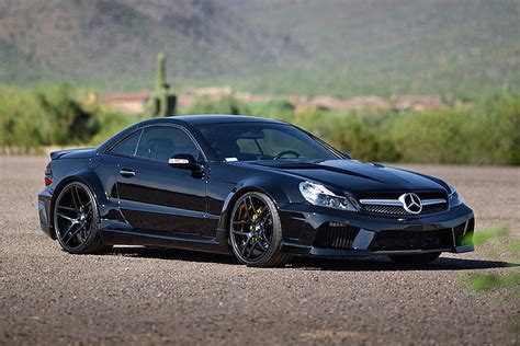 Mercedes sl55 amg. Although the SL55's footprints are essentially the same as the SL500's—the only difference is a slightly lower rear-tire profile (285/35ZR-18 versus 285/40ZR-18)—the AMG edition's Pirelli P ... 