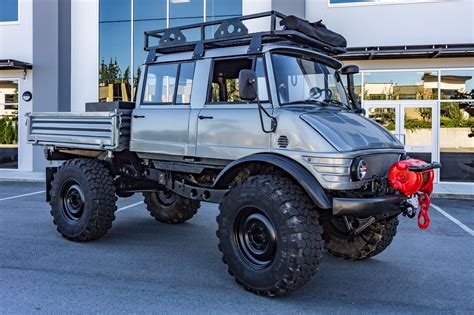 This Mercedes-Benz Unimog U1300L was acquired by seller in 2020 and is said to have been used as a fire truck in Germany prior to being imported to the United States under previous ownership. Power comes from a 5.7-liter diesel inline-six mated to an eight-speed manual transmission and a pneumatically-actuated transfer case as well as locking .... 