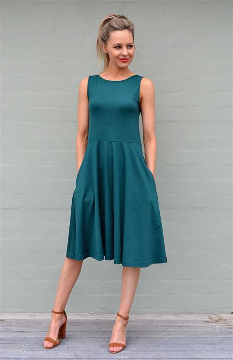 Merino wool dress. Avoid using hot water, as this can shrink the fibers. 3. Use a gentle cycle on your washing machine. 4. Lay your wool garment flat to dry. 5. Store your wool garment in a cool, dry place. If you want your merino wool clothing and accessories to last, wash them carefully and store them properly. 