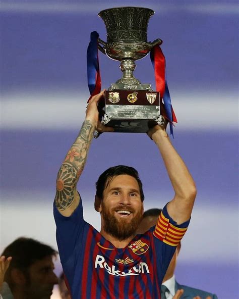 Argentina's Lionel Messi lifts the trophy